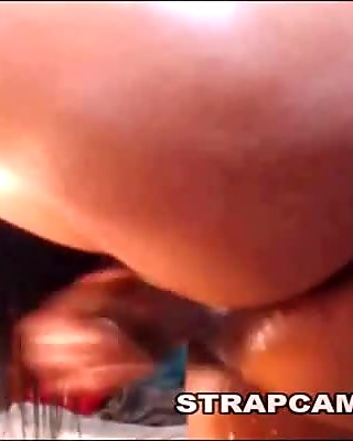 Busty latina dildoing wet pussy