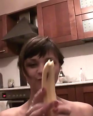 Young russian teen teasing in the kitchen