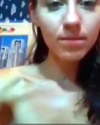 Petite brunette babe masturbating on her web cam