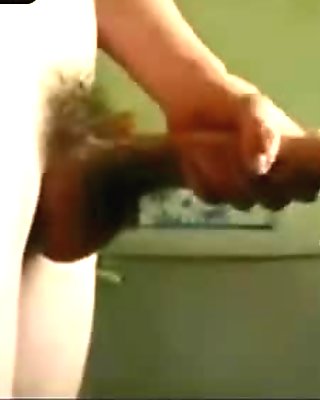 Hairy dude playing his uncut meat