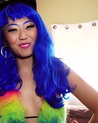 Asian cosplay girl in a blue wig wants dick in her pussy